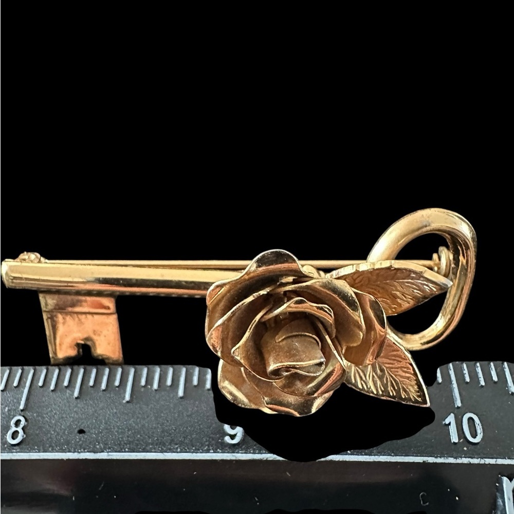 Gold Key Brooch with Flower Design